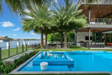 An unparalleled gated waterfront estate located on the deep