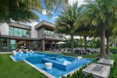 An unparalleled gated waterfront estate located on the deep