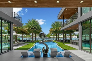 An unparalleled gated waterfront estate located on the deep