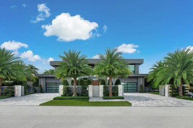 An unparalleled gated waterfront estate located on the deep