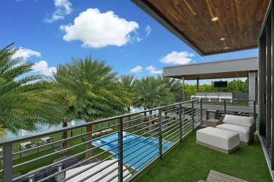 An unparalleled gated waterfront estate located on the deep