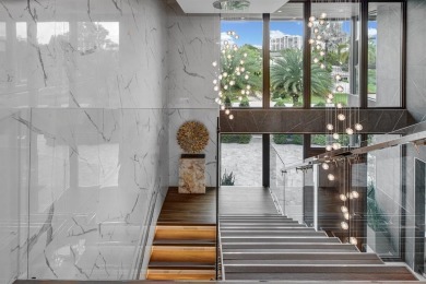 An unparalleled gated waterfront estate located on the deep