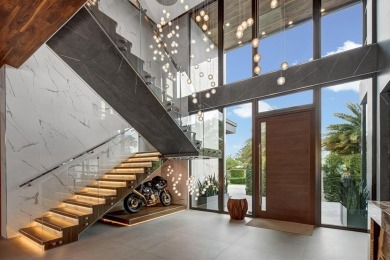 An unparalleled gated waterfront estate located on the deep