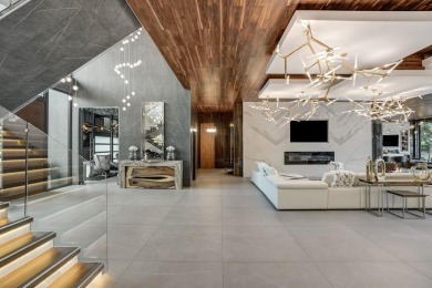 An unparalleled gated waterfront estate located on the deep