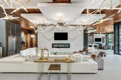 An unparalleled gated waterfront estate located on the deep