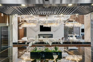 An unparalleled gated waterfront estate located on the deep