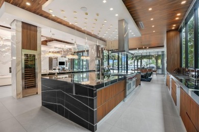 An unparalleled gated waterfront estate located on the deep