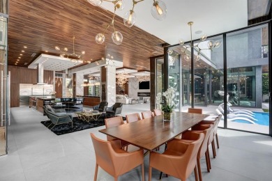 An unparalleled gated waterfront estate located on the deep