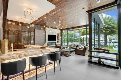 An unparalleled gated waterfront estate located on the deep