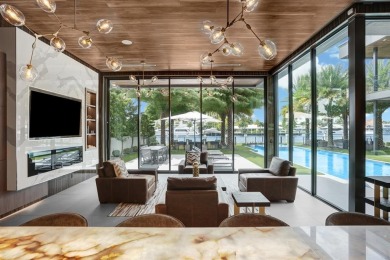 An unparalleled gated waterfront estate located on the deep