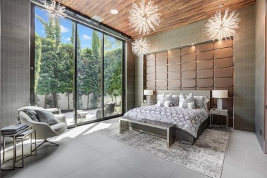 An unparalleled gated waterfront estate located on the deep