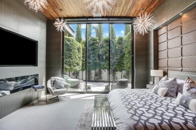 An unparalleled gated waterfront estate located on the deep