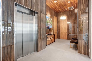 An unparalleled gated waterfront estate located on the deep