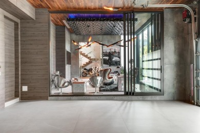 An unparalleled gated waterfront estate located on the deep