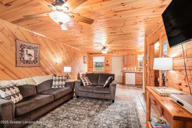 Nestled on the shores of the all-sports Bud Lake, this charming