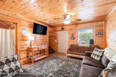 Nestled on the shores of the all-sports Bud Lake, this charming