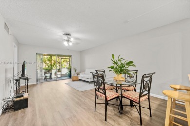 Welcome to this charming ground-floor 2-bed, 2-bath condo in the