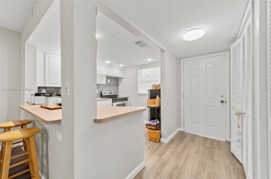 Welcome to this charming ground-floor 2-bed, 2-bath condo in the