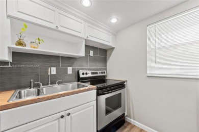 Welcome to this charming ground-floor 2-bed, 2-bath condo in the