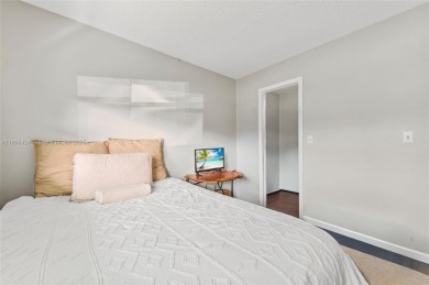 Welcome to this charming ground-floor 2-bed, 2-bath condo in the