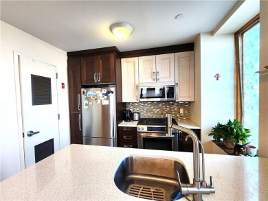 This charming one-bedroom condo is located in a well-maintained