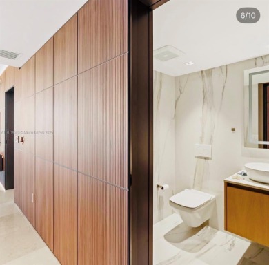 PRICE ADJUSTMENT FOR ICON BRICKELL CONDO, a waterfront and