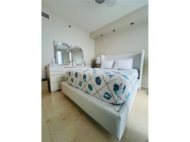 PRICE ADJUSTMENT FOR ICON BRICKELL CONDO, a waterfront and