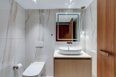 PRICE ADJUSTMENT FOR ICON BRICKELL CONDO, a waterfront and