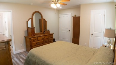 ABSOLUTELY STUNNING lake home right off of Hwy UU and just 3.4