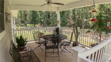 ABSOLUTELY STUNNING lake home right off of Hwy UU and just 3.4