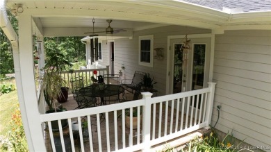 ABSOLUTELY STUNNING lake home right off of Hwy UU and just 3.4