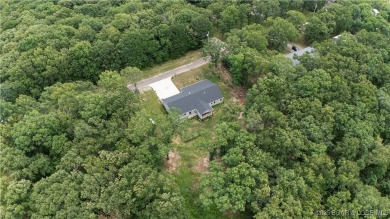 ABSOLUTELY STUNNING lake home right off of Hwy UU and just 3.4