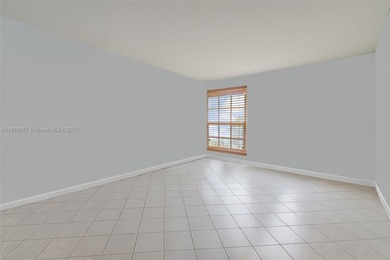 Live your dream steps from the ocean! This bright and inviting