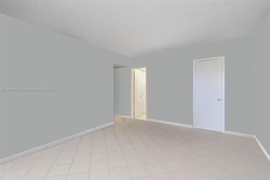 Live your dream steps from the ocean! This bright and inviting