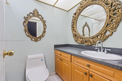 Live your dream steps from the ocean! This bright and inviting