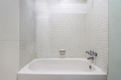 Live your dream steps from the ocean! This bright and inviting