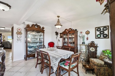 Wake up to gorgeous river views in this bright and breezy