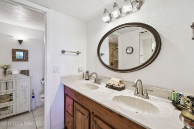 Wake up to gorgeous river views in this bright and breezy