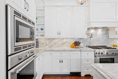 RIO VISTA! This stunning waterfront estate boasts 5 BD | 5 BA |