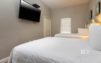 This rare 1st floor unit allows you to park directly in front of