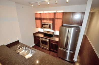 Ready to move-in, like new, one bedroom + den condo on 32nd