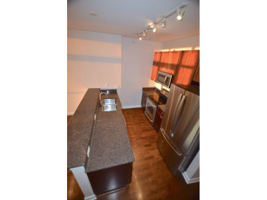 Ready to move-in, like new, one bedroom + den condo on 32nd