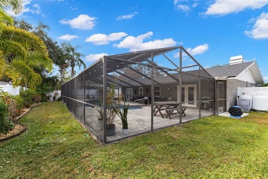 Welcome home to 2420 Osprey Ave, Palm Harbor, FL 34683. Totally