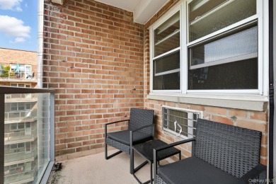 6th Floor 1-Bedroom Co-op with Private Balcony & Stunning Water