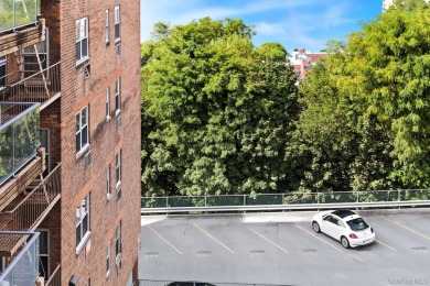 6th Floor 1-Bedroom Co-op with Private Balcony & Stunning Water