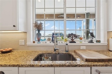 Luxury waterfront living in an exceptionally crafted, custom