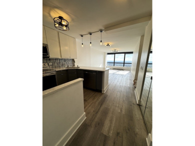 Spectacular lake and skyline views define this beautifully