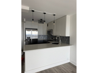 Spectacular lake and skyline views define this beautifully