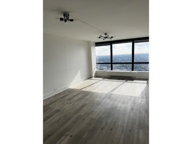 Spectacular lake and skyline views define this beautifully