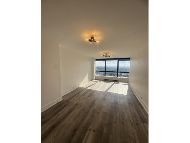 Spectacular lake and skyline views define this beautifully